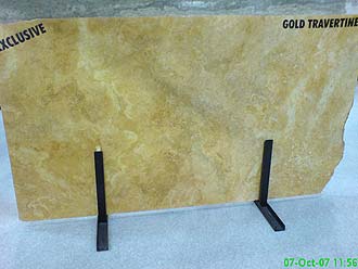 Gold travertine Beautiful granite, onyx, marble and travertine slabs. Best Suppliers of granite slabs in the world. Exquisite and exclusive granites and marbles.  London Granite at Verona Stone Fair. Fantastic and new natural stone surfaces for your granite worktops, kitchen worktops, marble tops, travertine floors and shower/Jacuzzi enclosures.
