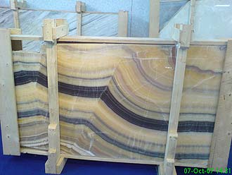 Exotic onyx slabs Beautiful granite, onyx, marble and travertine slabs. Best Suppliers of granite slabs in the world. Exquisite and exclusive granites and marbles.  London Granite at Verona Stone Fair. Fantastic and new natural stone surfaces for your granite worktops, kitchen worktops, marble tops, travertine floors and shower/Jacuzzi enclosures.